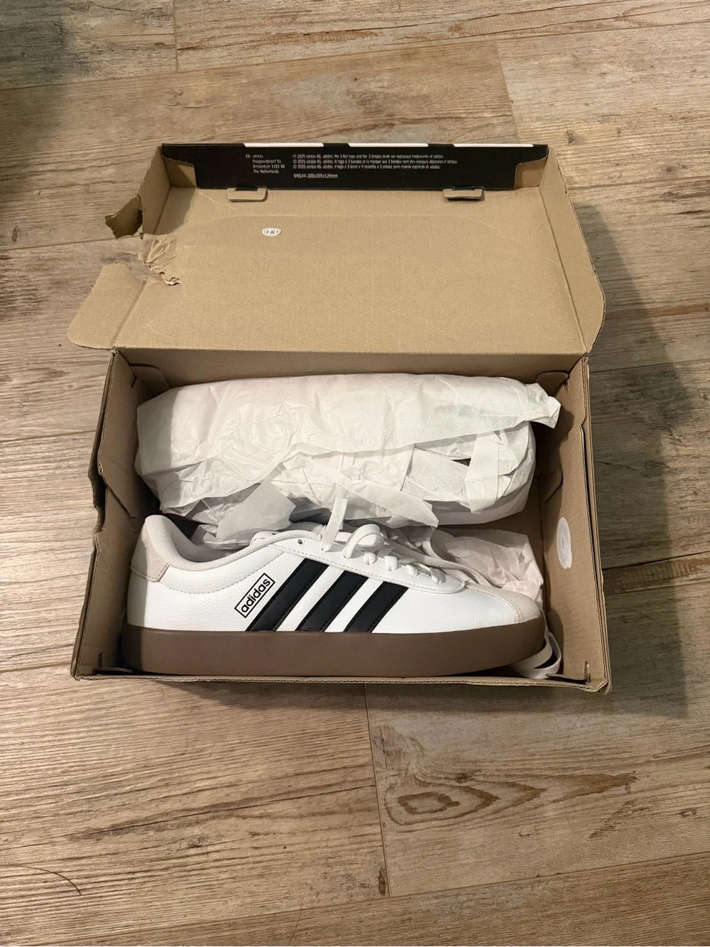 adidas White Sneakers with Black Stripes and Brown Sole